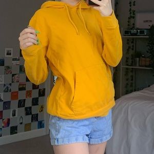 yellow sweatshirt